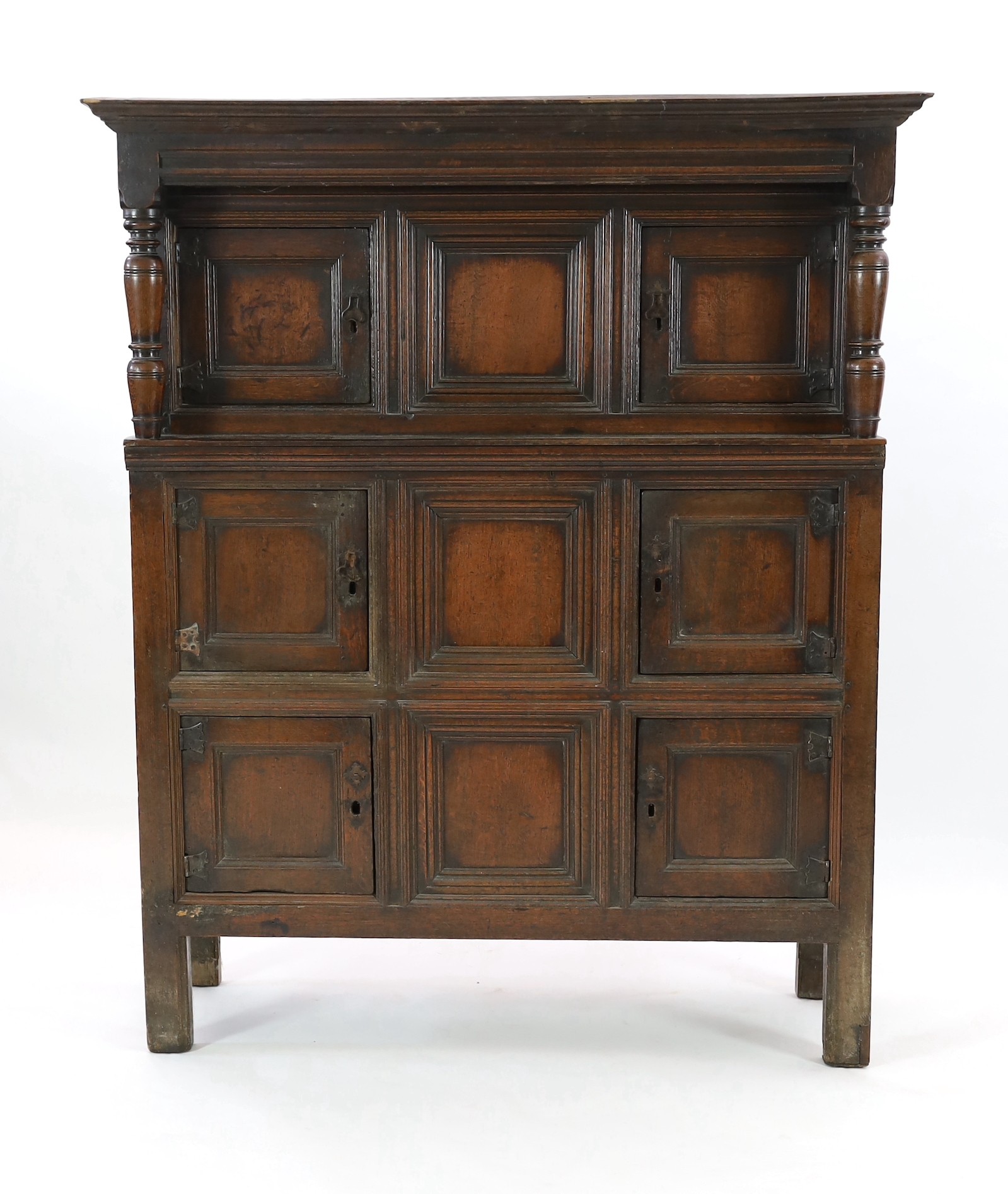 A mid 18th century oak cupboard, W.146cm D.51cm H.175cm